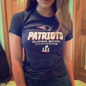 A Patriots Football Team Super Bowl shirt.